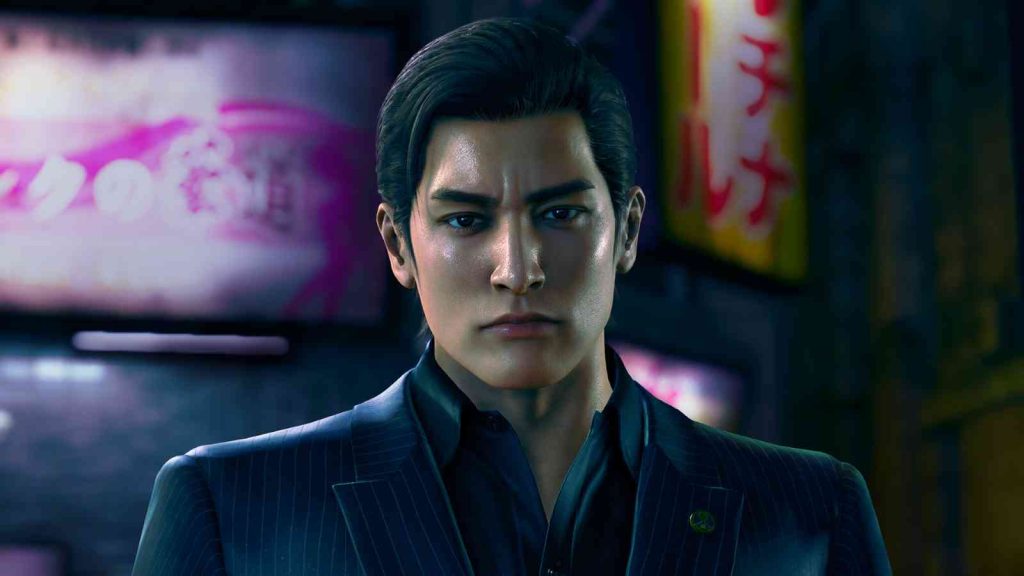 Kazuma Kiryu wearing a black suit at night and frowning in Yakuza Kiwami 3